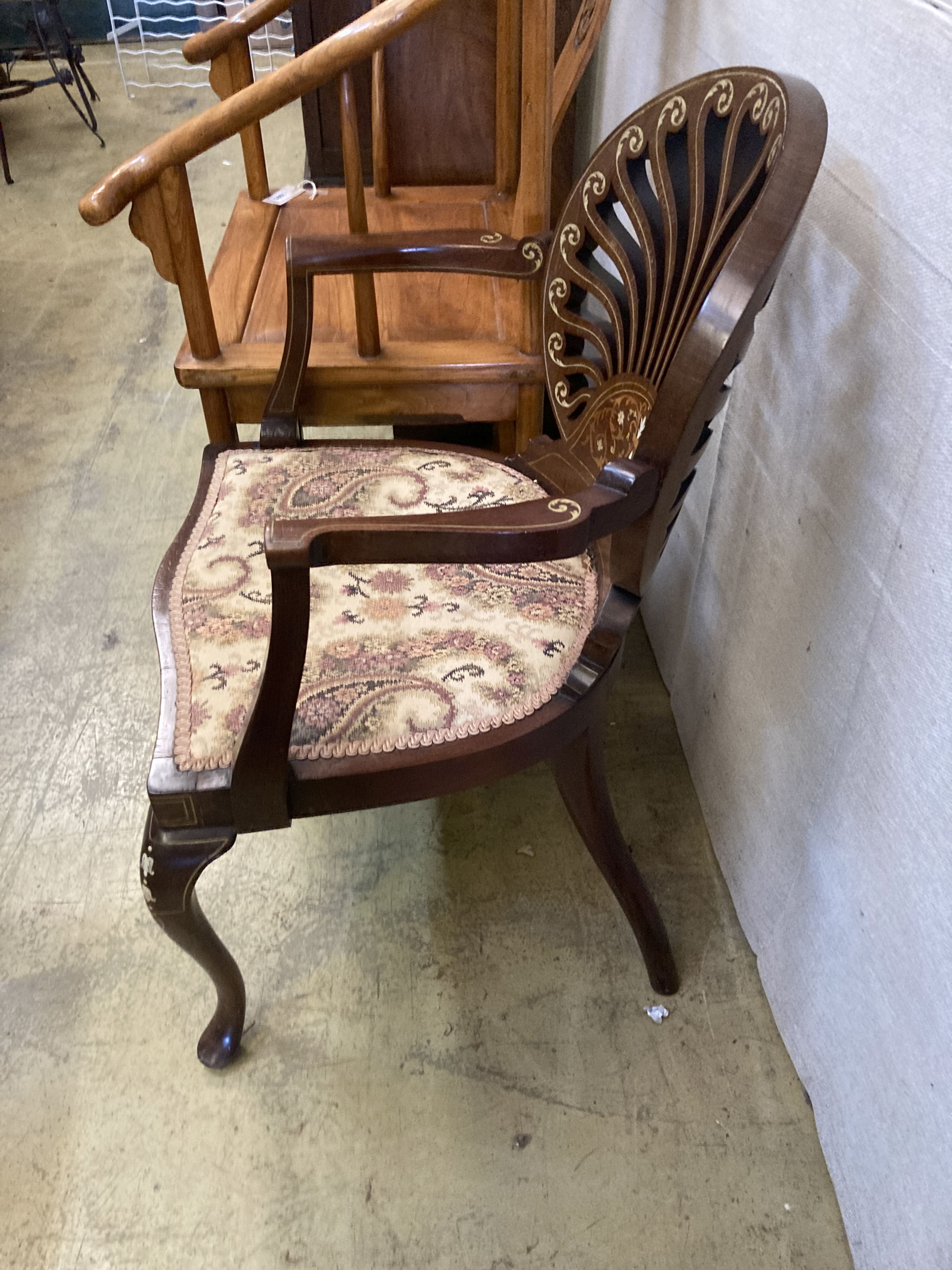 A pair of late Victorian inlaid mahogany elbow chairs, width 57cm, depth 46cm, height 87cm